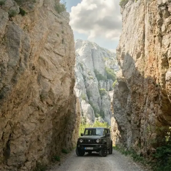 Gelaendewagen auf der Dabarska cesta im Velebit Gebirge Kroatien